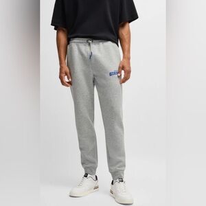 Hugo Boss
NFL Men's Signature-Tape Tracksuit Bottoms